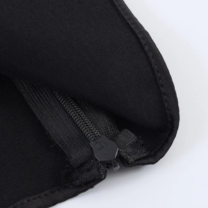 Detailed close-up of a high-quality black zipper with Z-logo and fine twill fabric texture