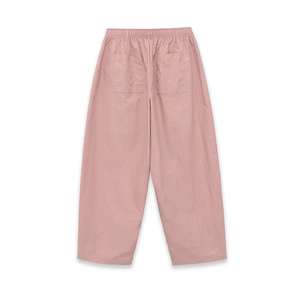 Pantalon large rose clair minimaliste avec taille élastique à cordon et poches arrière
