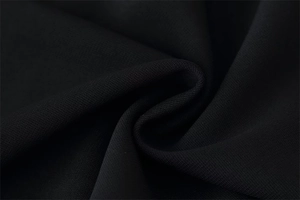 Macro de la texture du tissu en maille noire de haute qualité avec détails de tissage