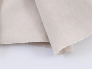 Primer plano detallado de la textura de tela a rayas beige claro con tejido de mezcla