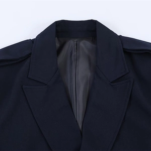 Dark navy oversized blazer with classic lapels, epaulettes and premium textured woven fabric