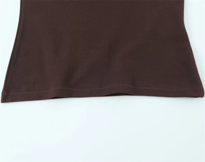 Detail of double-needle stitching on the hem of a dark brown slim V-neck T-shirt