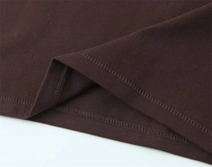 Detailed view of brown cotton t-shirt with professional double-needle coverstitch hem