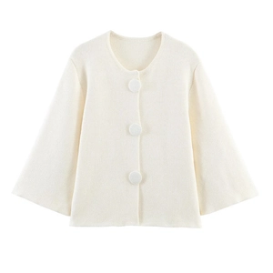 Minimalist cream knit cardigan with round neck and large buttons in a loose fit style