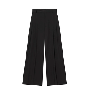 Pantalon large plissé noir minimaliste pour femme avec drapé élégant et look formel chic