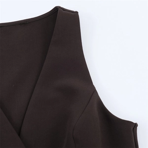 Detail view of deep coffee V-neck vest top with smooth fabric and neat stitching