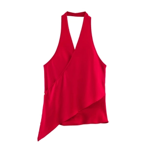 Detail of glossy red satin halter wrap top with asymmetric hem and deep V-neckline