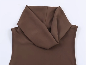 Close-up detail of the elegant cowl neck design on a brown sleeveless fashion top