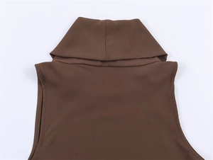 Detail of the high-neck sleeveless brown top featuring premium stitching and elastic fabric