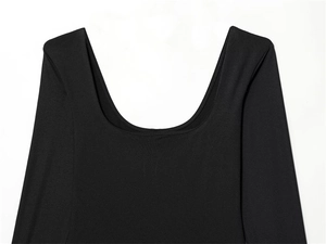 Close-up of deep scoop neckline on black slim-fit bodysuit with fine knitted texture