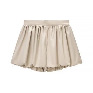 Short bouffant plissé à taille haute en tissu soyeux abricot avec ourlet bulle élégant