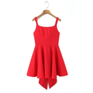 Detail view showing the elegant back bow on this vibrant red square neck sleeveless mini dress
