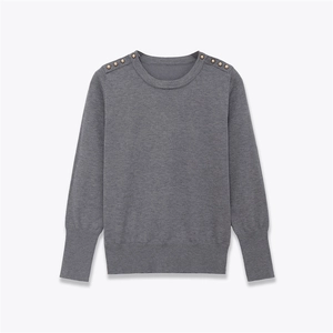 Dark grey long sleeve knit sweater for women with decorative gold buttons on shoulders