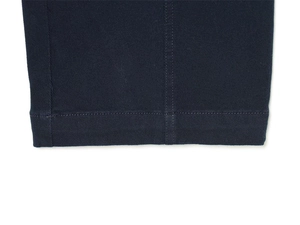 Macro detail of dark blue twill cotton fabric with reinforced double stitching hem