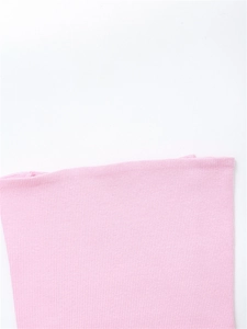 Close-up of pink ribbed knit fabric texture showing high elasticity and fine vertical lines