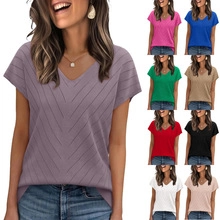 Detail of diagonal ribbed texture on a casual V-neck short sleeve knit top for women