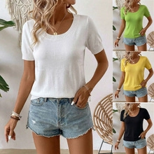 Detail view of ribbed crew neck and soft knit texture on short sleeve summer tops