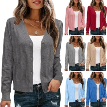 Detail view of multi-color V-neck knit cardigans featuring ribbed cuffs and button closures