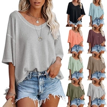 Detailed color swatches of women's loose waffle knit V-neck tops in nine various shades