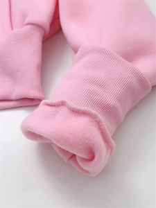 Detail of pink hoodie ribbed cuffs with thick fleece lining for warmth and comfort