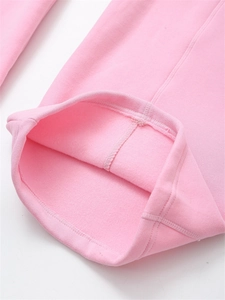 Close-up of pink fleece jogger cuffs showing smooth stitching and warm inner lining