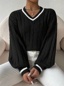 Women's V-neck cable knit sweater in black with white stripe trim and lantern sleeves