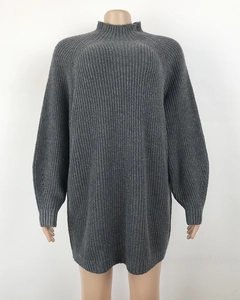 Detail of dark grey mock neck knitted dress with ribbed cuffs and textured vertical stitch