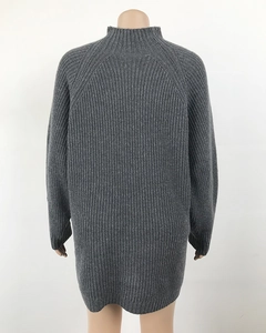 Detail of the back view of a dark grey knit midi dress with raglan sleeves and rib texture