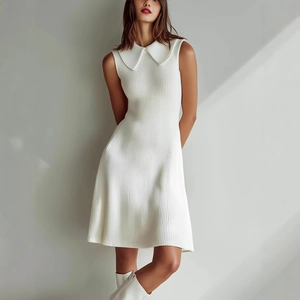 White sleeveless ribbed knit A-line dress with a classic Peter Pan collar and slim fit