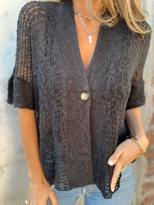 Women's black crochet knit V-neck cardigan with a single button and bell sleeves