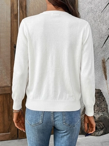 Rear view of slim fit white knit cardigan with ribbed cuffs and round neck detail