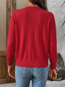 Slim fit red long sleeve knit cardigan for women shown from the back perspective