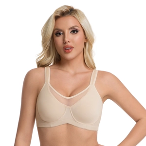 Plus size full cup mesh bra in beige with wide shoulder straps on a model