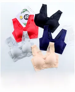 Flat lay of seamless wireless sports bras in five colors with wide shoulder straps