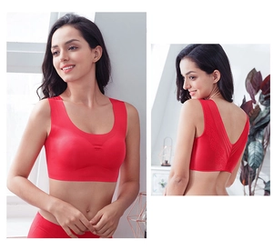Detailed front and lace back view of a seamless red sports bra with wireless design
