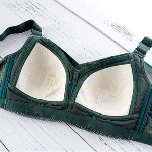 Dark green full coverage plus size wireless bra with breathable laser-cut cups and lace