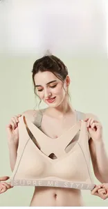 Detail of nude seamless sports bra with wide straps and SUPRE ME STYLE elastic band