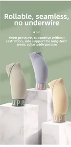 Three seamless sports bras in soft colors on marble pedestals showing rollable fabric