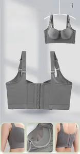 Detailed view of the wide side wings and seven-row hook eye closure on the grey bra