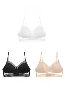 Confronto dettagliato di reggiseni sottili in pizzo bianco, nero e nudo con fascia in rete
