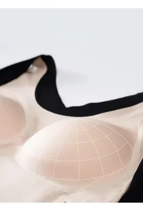 Detail view of 3D seamless bra cups with interior support and breathable nude fabric