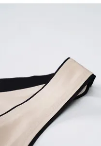 Detail of wide breathable mesh shoulder straps for seamless plus size sports bras