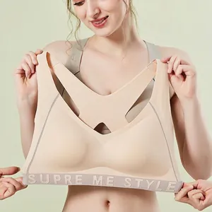 Seamless high-impact sports bra in nude with elastic logo waistband for running and fitness