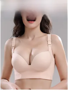 Detailed view of beige seamless full coverage bra with wide side wings and adjustable straps