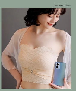 Detail of floral lace strapless tube top bra with rhinestone accent in beige