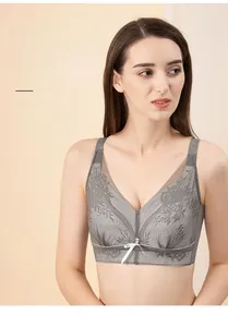 Detail of grey deep V lace bra with breathable floral embroidery and silk bow