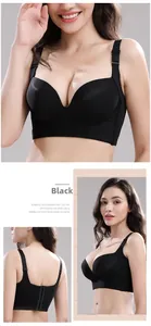 Detail view of black wireless bra showing wide side wings and multi-row hook closure
