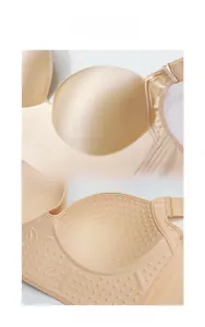 Detail view of nude full cup bra with massage inner texture and butterfly wing embossing