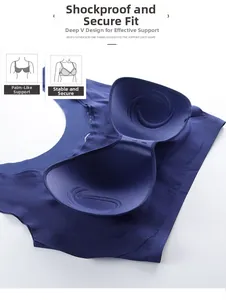 Detail of navy blue sports bra showing internal palm-shaped padding for shock absorption