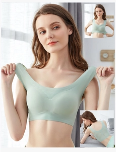 Detail of mint green seamless bra with butterfly lace back and breathable jacquard design